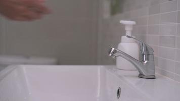 Men are washing by soap their hands to kill germs. Frequent hand washing helps to prevent infection that comes from contact. The concept of cleanliness for good health. video