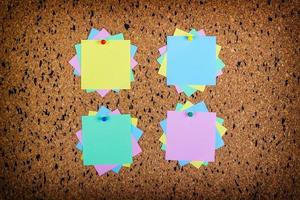 sticky note on cork board, empty space for text photo