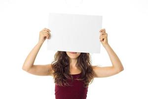 girl in red dress with white placard photo