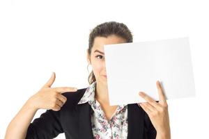 woman in uniform with white placard in hands photo