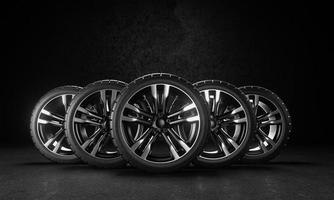 Five car wheels on asphalt and black background. Poster or cover design. 3D rendering illustration. photo