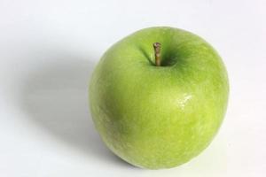 Fresh green apples on a white background. photo