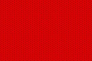 Knitting pattern. Knitted realistic seamless background of red color. photo
