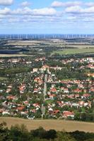 Ecological city Goerlitz, in Germany and wind turbines at horizon photo