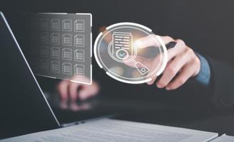 Businessman Audit documents, quality assessment management With a checklist, business document evaluation process, market data report analysis and consulting, review process correctness of document photo
