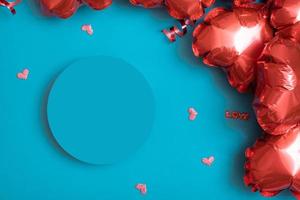 Podium or pedestal and gift box with red heart shape baloons on turquoise background. Valentines Day temlate photo
