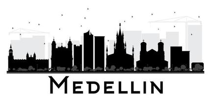 silueta en blanco y negro del horizonte de la ciudad de medellín. vector