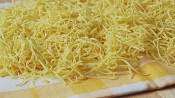 Dry homemade soup noodles. Raw small noodles. video