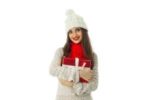 woman in warm sweater and red scarf photo