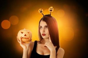 pretty girl in halloween style clothes photo