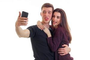 funny young couple makes selfi photo