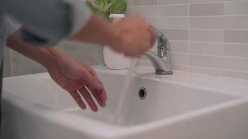 Men washing hands with soap and rubbing on hands around different areas for clean. Frequent hand washing will help prevent infection from contact. Concept of cleanliness for good health. video