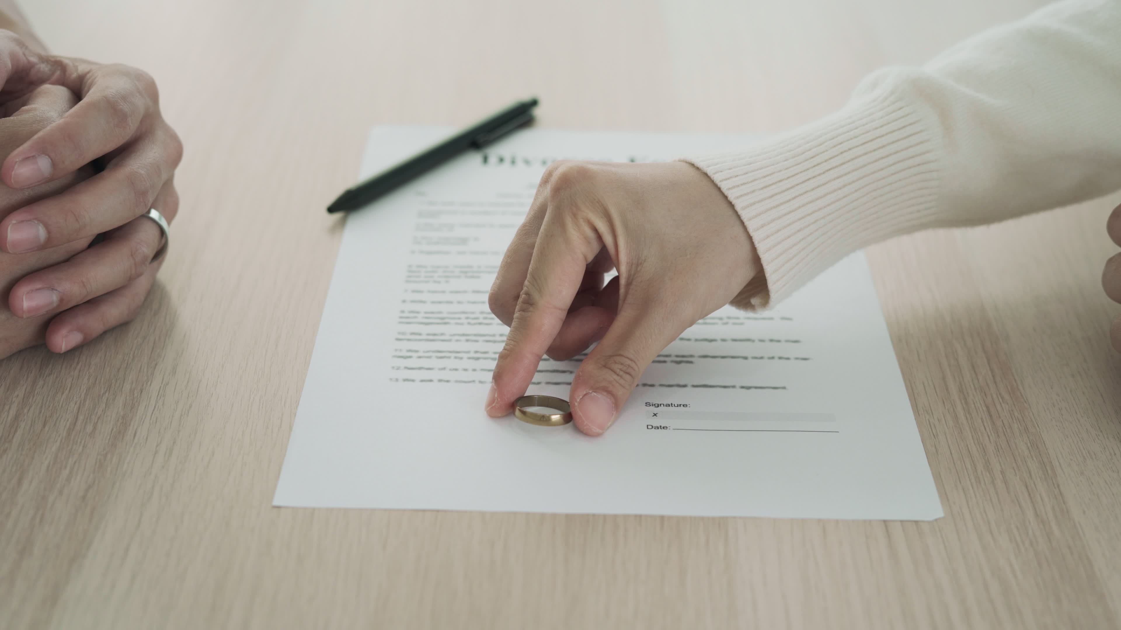 Couple is feeling stressed after agreeing to sign a divorce certificate Couple is feeling stressed after agreeing to sign a divorce certificate