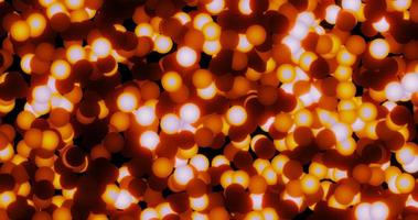 Orange beautiful bright luminous shiny iridescent balls circles of festive New Year's Christmas garlands or toys. Abstract background photo