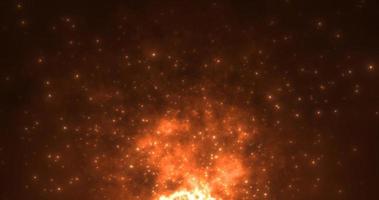 Abstract orange fiery flame bonfire of particles and sparks glowing beautiful magical on a dark background. Abstract background photo
