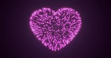 Abstract purple pink fireworks festive fireworks for valentine's day in the shape of a heart from glowing particles and magical energy lines. Abstract background photo