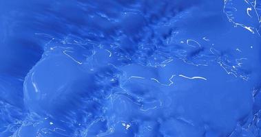 Blue bright beautiful flowing water, blue colored liquid. Abstract background photo