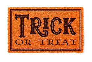 Trick Or Treat Halloween Orange Welcome Mat Isolated on White Background photo