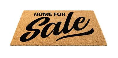 Home For Sale Welcome Mat Isolated On A White Background photo