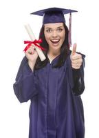 Mixed Race Graduate in Cap and Gown Holding Her Diploma photo