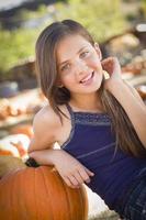 Preteen Girl Portrait at the Pumpkin Patch photo