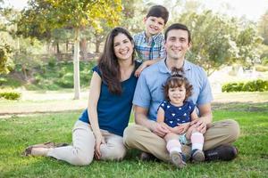 Attractive Young Mixed Race Family Portrait in the Park. photo