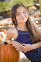 Preteen Girl Portrait at the Pumpkin Patch photo