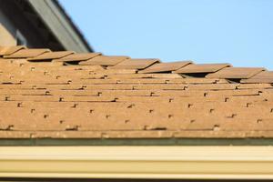 Roof of House with Concrete Tiles. photo