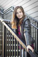 Portrait of Pretty Young Girl Weather Leather Jacket photo