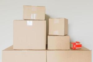 Variety of Packed Moving Boxes In Empty Room photo