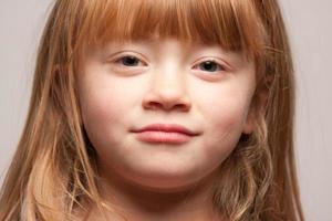 Portrait of an Adorable Red Haired Girl photo