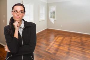 Woman In Empty Room of New House photo