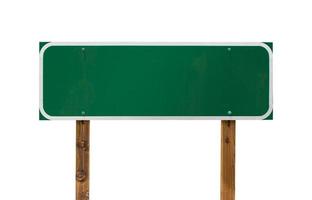 Blank Green Road Sign with Wooden Posts Isolated on a White Background photo