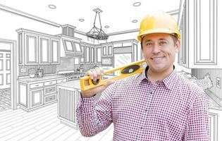 Contractor in Hard Hat with Level Over Custom Kitchen Drawing photo