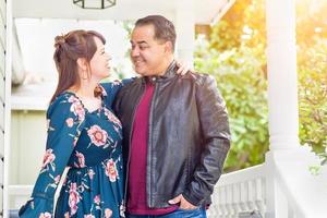 Portrait of Mixed Race Caucasian Woman and Hispanic Man photo