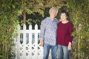 Attractive Chinese Couple Enjoying Their House photo