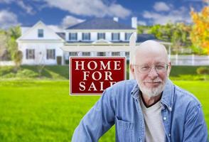 Senior Adult Man in Front of Real Estate Sign, House photo