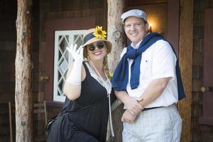 Attractive Couple Dressed in Outfits from the Twenties Era photo