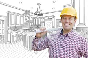 Contractor in Hard Hat Over Custom Kitchen Drawing photo