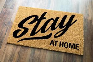 Stay At Home Welcome Mat On Floor photo