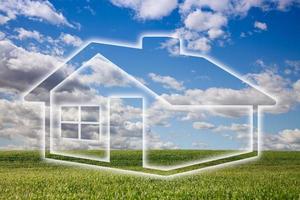 Dreamy House Icon Over Grass Field and Sky photo