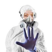 Chinese Woman Wearing Hazmat Suit, Protective Gas Mask and Goggles Isolated On White photo