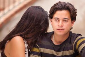 Attractive Hispanic Couple During A Serious Moment photo