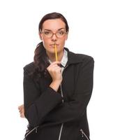 Serious Mixed Race Businesswoman Holding A Pencil Isolated on a White Background photo