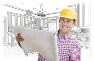 Contractor Holding Blueprints Over Custom Kitchen Drawing photo