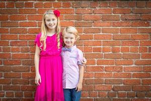 Cute Young Caucasian Brother and Sister Portrait photo