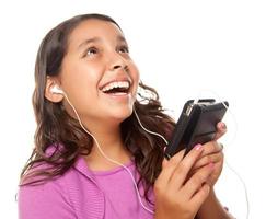 Pretty Hispanic Girl Listening and Dancing to Music photo