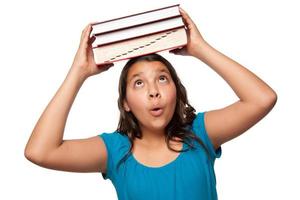 Pretty Hispanic Girl with Books on Her Head photo