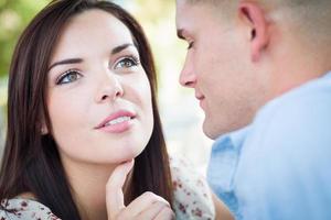 Happy Romantic Caucasian Couple Portrait in the Park. photo