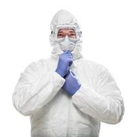 Man Wearing Hazmat Suit, Goggles and Medical Face Mask Isolated On White photo